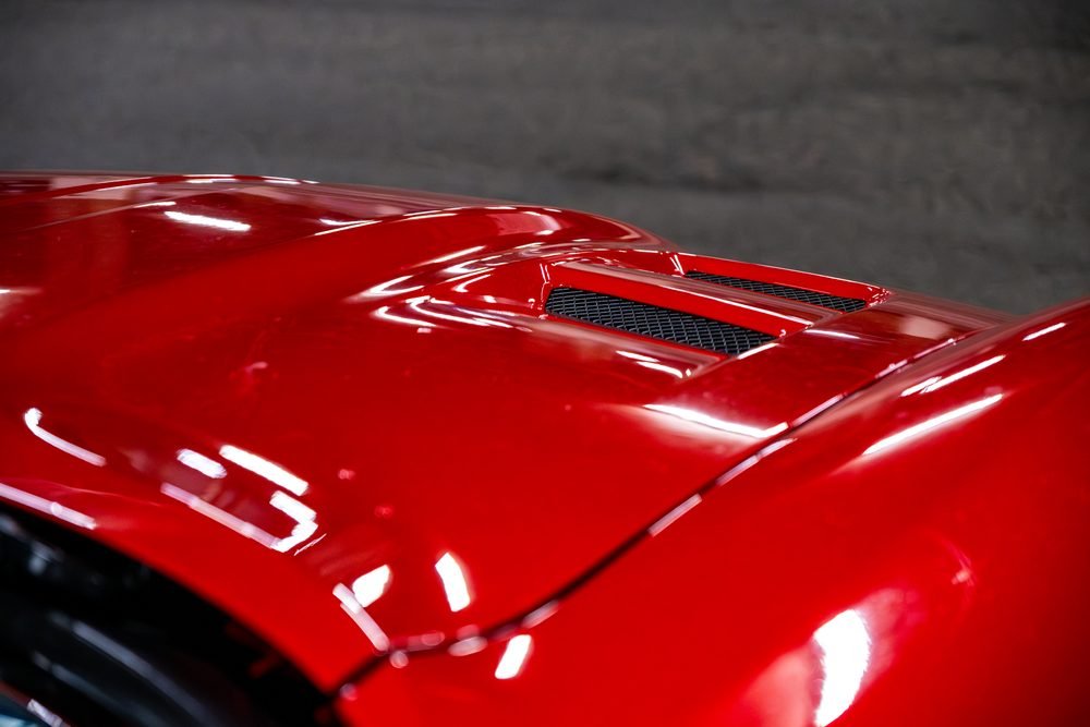 Ferraris, imports and modified cars under carpark lighting at a late-night Sydney car meet (frame 25 of 40)
