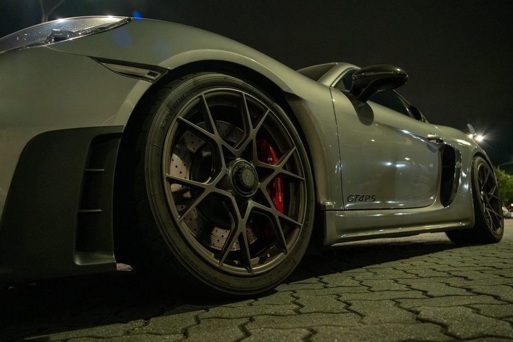 Ferraris, imports and modified cars under carpark lighting at a late-night Sydney car meet (frame 35 of 40)