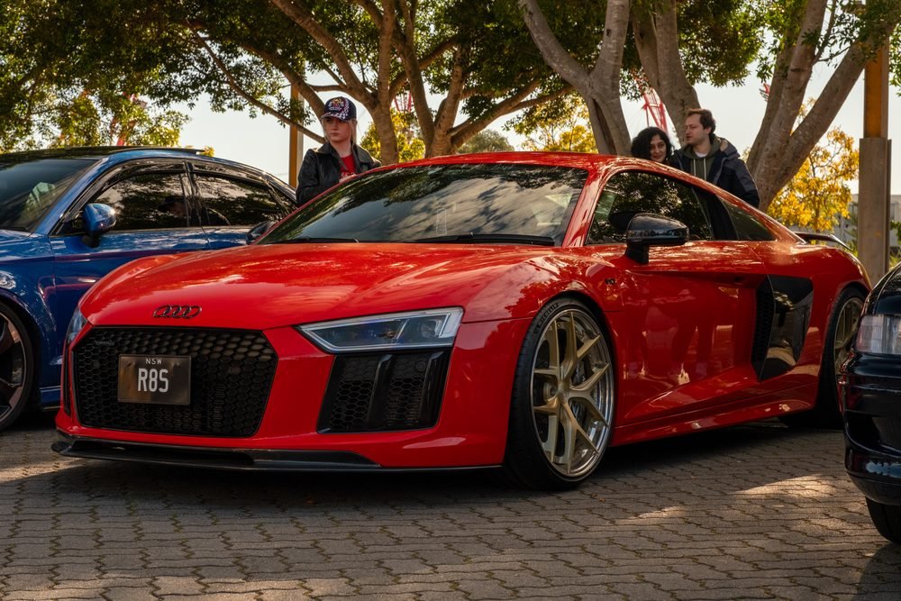 Red Audi R8 V10 on gold forged wheels at a morning car meet in Sydney