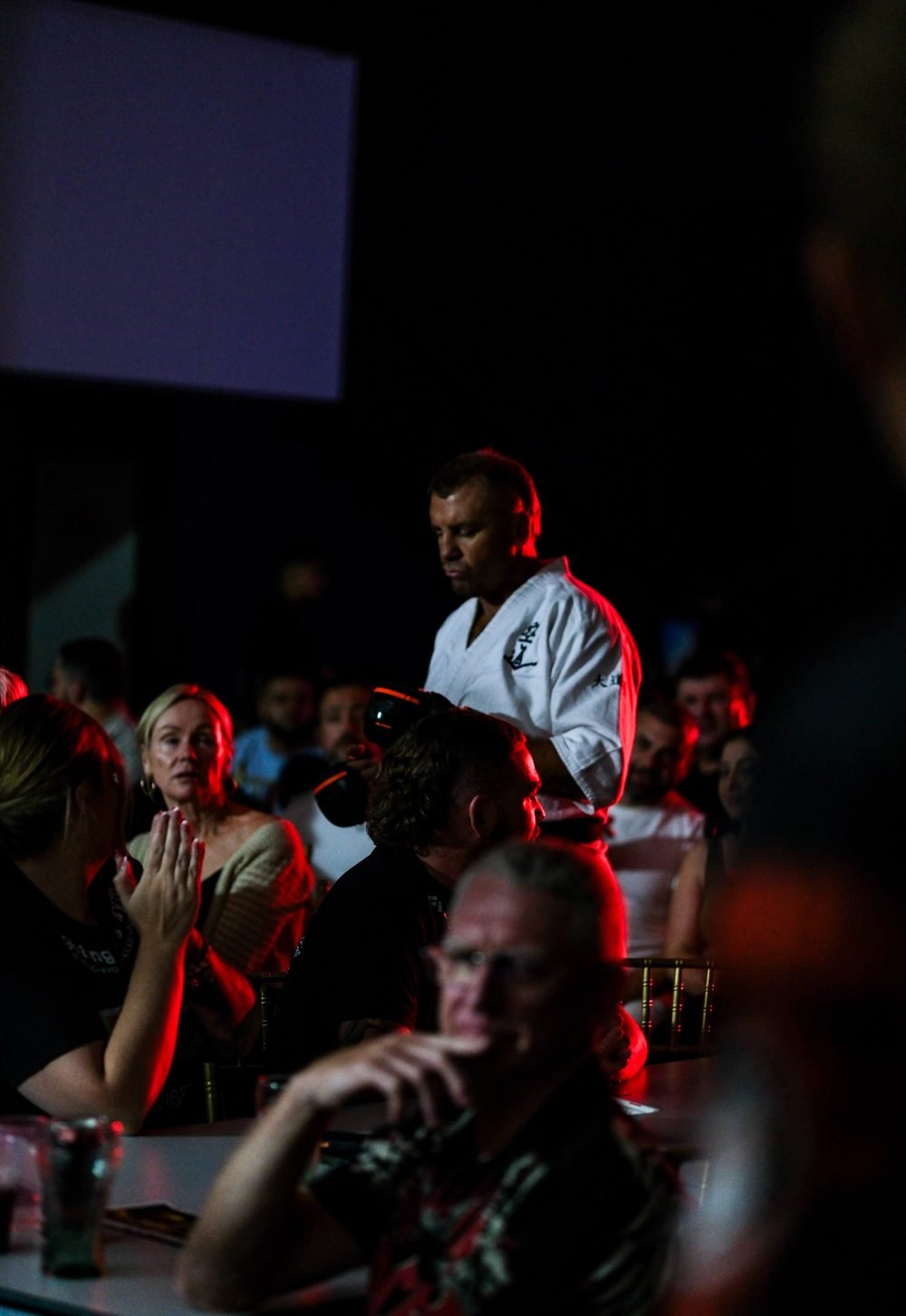 Ringside boxing photography at a Sydney fight night, shot in venue lighting (frame 1 of 24)