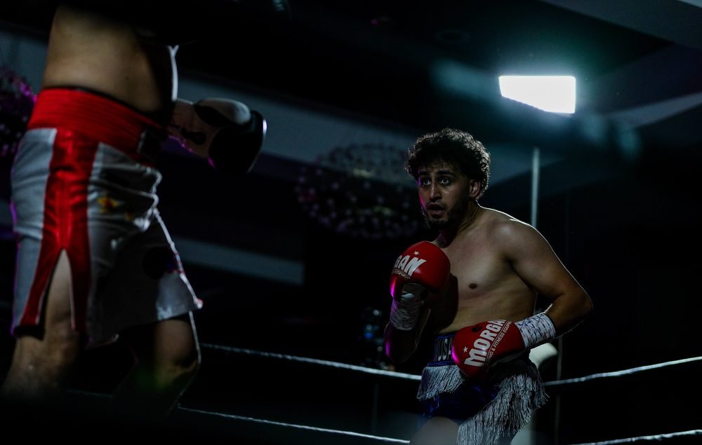 Ringside boxing photography at a Sydney fight night, shot in venue lighting (frame 8 of 24)