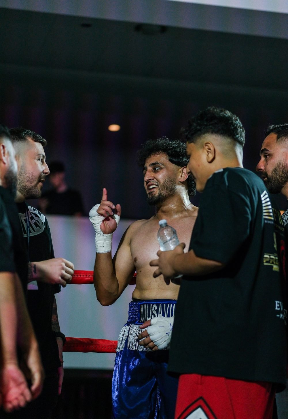 Ringside boxing photography at a Sydney fight night, shot in venue lighting (frame 16 of 24)