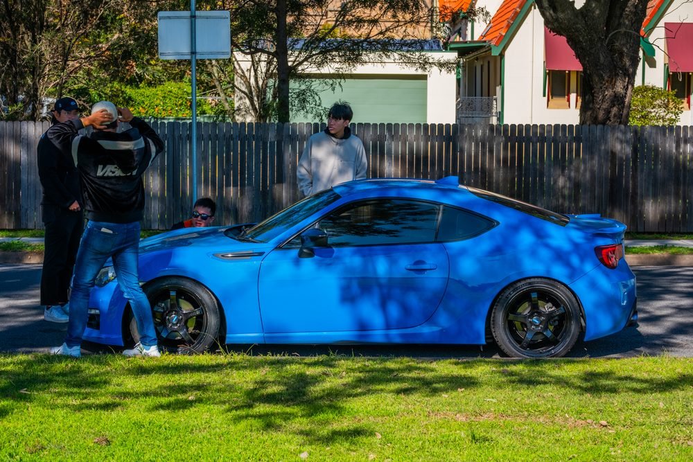 Blue Subaru BRZ parked on a suburban Sydney street with its owners