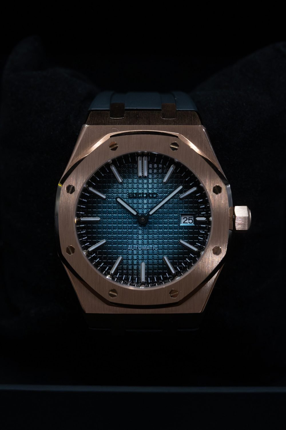 Studio watch photography, lit for steel, sapphire and lacquer on a black ground (frame 7 of 12)